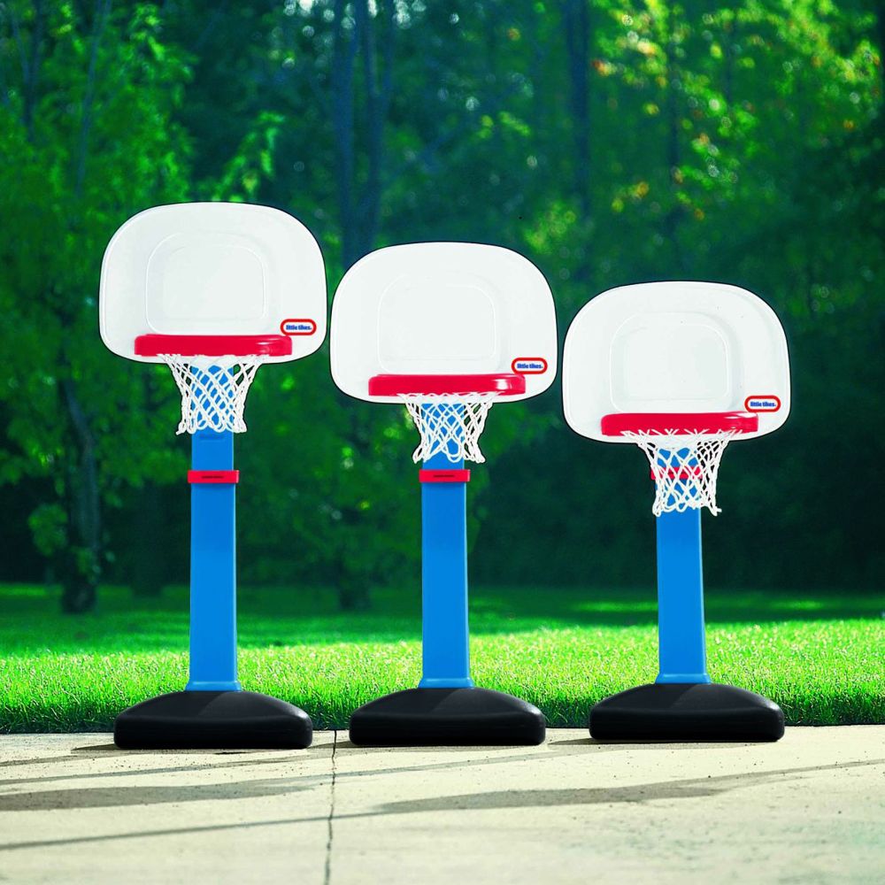Three basketball hoops, all adjusted to different heights.