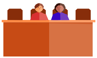 Two judges sitting at a table.