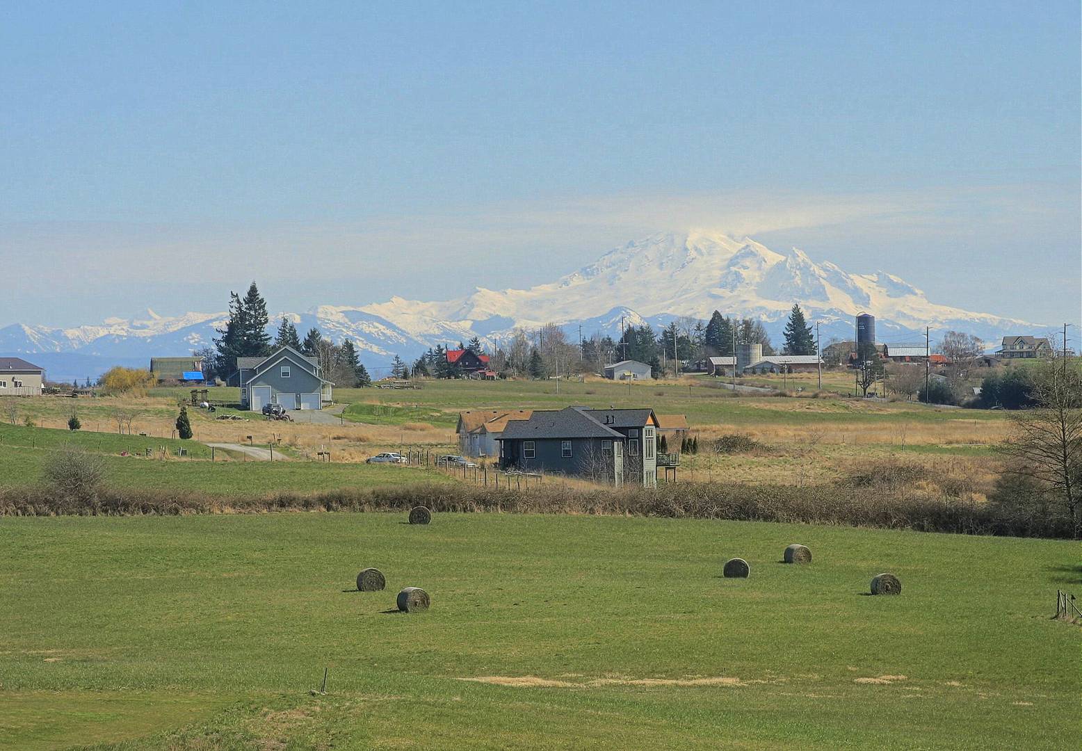 A image of Ferndale, WA. Farms, mountains, hay.