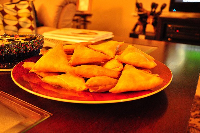 A giant plate of delicious samosas.