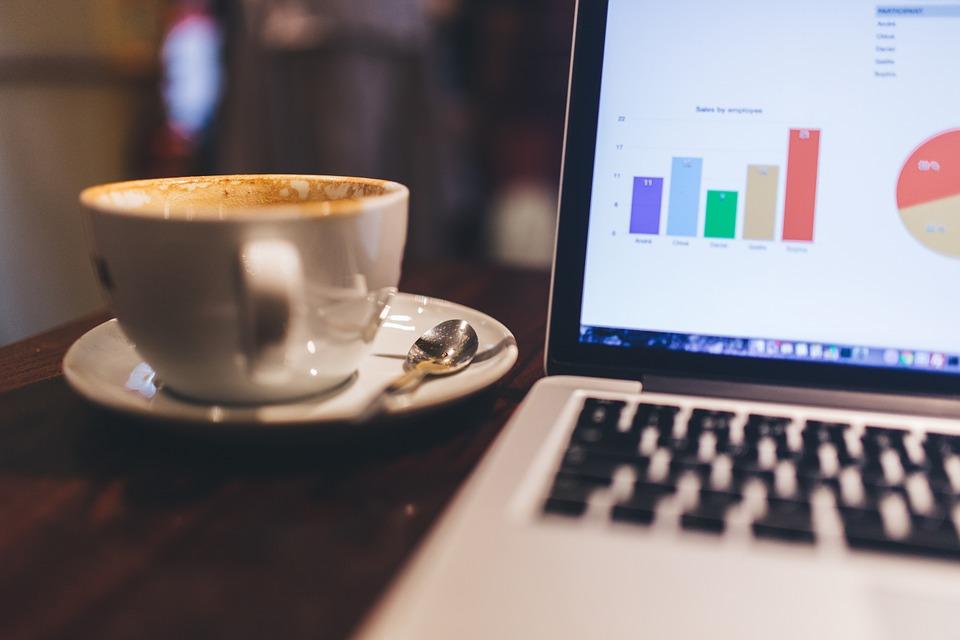 Image of coffee and a laptop