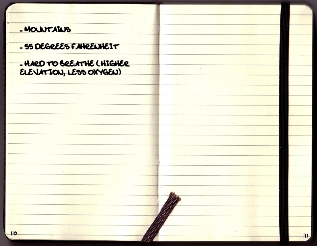 A notebook that says mountains, 55 degrees Fahrenheit, and hard to breathe (higher elevation, less oxygen). 