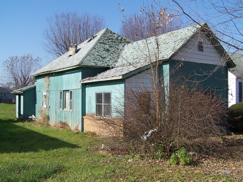 image of a house in less than perfect condition