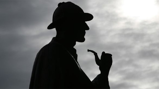 Shadowy picture of a detective.
