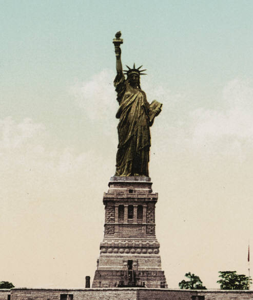 Image description: Statue of Liberty in original color of copper, circa 1900.
