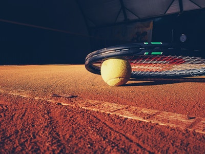 Tennis ball and racket