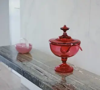 Image description: ruby colored glass