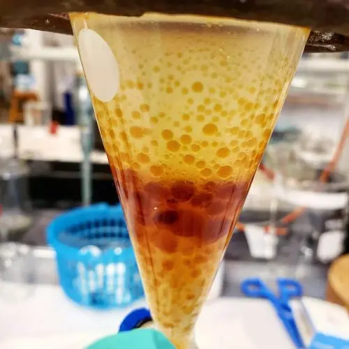 Image description: An emulsion starting to separate