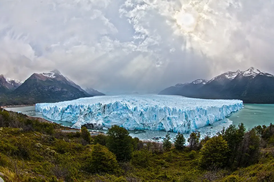 Ice (solid water) is less dense than liquid water. That's why ice floats.